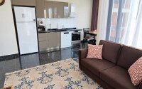 Апартаменты 1+1 площадью 52 м² в районе Махмутлар — 800 м до моря-id-11087-фото-3