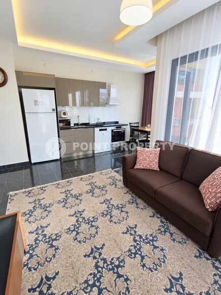 Апартаменты 1+1 площадью 52 м² в районе Махмутлар — 800 м до моря-id-11087-фото-3