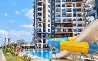 Апартаменты 1+1 площадью 52 м² в районе Махмутлар — 800 м до моря-id-11087-фото-1
