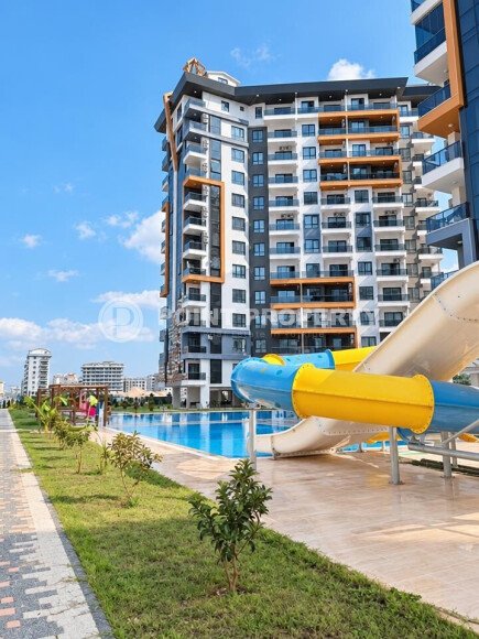 Апартаменты 1+1 площадью 52 м² в районе Махмутлар — 800 м до моря-id-11087-фото-1