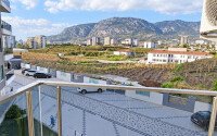 Апартаменты 1+1 площадью 52 м² в районе Махмутлар — 800 м до моря-id-11087-фото-8