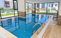 Апартаменты 1+1 площадью 52 м² в районе Махмутлар — 800 м до моря-id-11087-фото-13