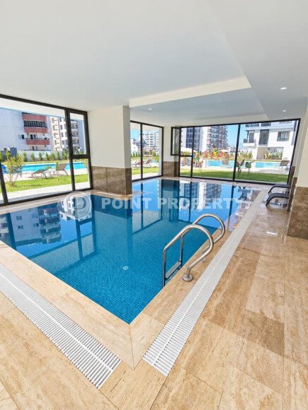 Апартаменты 1+1 площадью 52 м² в районе Махмутлар — 800 м до моря-id-11087-фото-13