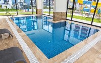Апартаменты 1+1 площадью 52 м² в районе Махмутлар — 800 м до моря-id-11087-фото-15
