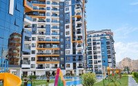 Апартаменты 1+1 площадью 52 м² в районе Махмутлар — 800 м до моря-id-11087-фото-19