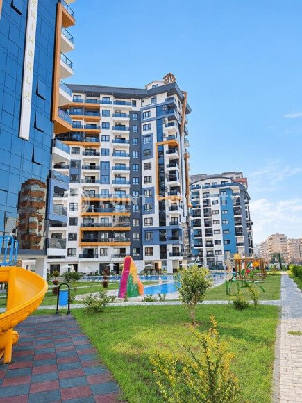 Апартаменты 1+1 площадью 52 м² в районе Махмутлар — 800 м до моря-id-11087-фото-19